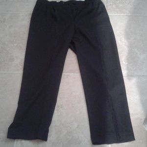 Black men's dress pants. Frayed bottom.